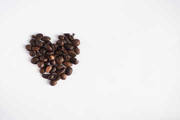 coffee beans with heart - shaped on a white background