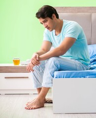 Wall Mural - Man suffering from sleeping disorder and insomnia