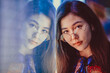 © oneinchpunch - Beautiful young asian woman wearing fashionable attire portrait with blurred city lights - Stylish teen female with cool style
