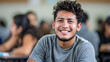 © Radiant Art - Smiling Latino Male Student in Classroom other students in the background