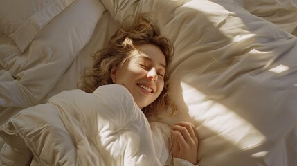 Wall Mural - A woman is sleeping on a bed with a blanket