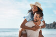 © Chanelle2000/peopleimages.com - Love, adventure and piggyback with couple, beach and happy people for anniversary on holiday together. Romance, African man and woman with ocean, summer break and relax with sunset on vacation