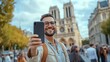 © The Little Hut - Handsome man taking selfie with smart mobile phone device on city street  Happy tourist visiting Notre Dame in Paris France  Summer holidays and travel influencer concept : Generative AI