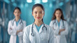 © ChaoticDesignStudio - Young female doctor in a medical facility with colleagues