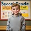 © Alena - 2nd grade schoolboy in gray hoodie tshirt mockup, elementary school student nere bulletin board. Children's back to school, first school day blank sweatshirt template mock up. Kids autumn outfit mock