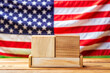 © thanakrit - Wooden Blocks American Flag Background Mockup