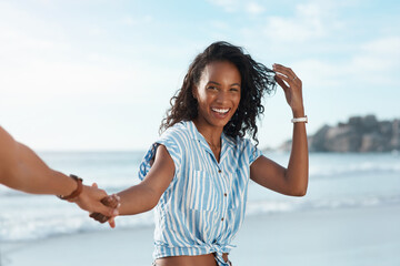 Love, portrait and holding hands pov with woman, beach and happy relationship for anniversary on holiday together. Romance, African man and woman with smile, break and bonding with sunset on vacation