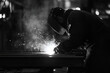 © Shafiqah - a worker welding iron in black and white
