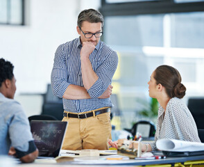 Aufkleber - Group, talking and mature man in office, creative and ideas for project, thinking and suggestions. People, designer and laptop for brainstorming, teamwork and boss with employees for deadline