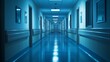 © Thongthawee - An empty hospital hallway at night, dimly lit, evoking a sense of loneliness and quiet reflection, with soft shadows and cool tones, Cinematic