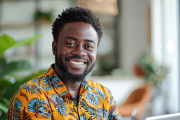 Poster - A man with a beard and a smile is wearing a yellow shirt with a floral pattern