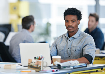 Canvas Print - Portrait, businessman and laptop in office for coworking, online inspiration and ideas for website creation. Career, male person or graphic designer with computer for solution, research and serious