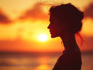 Wall Mural - serene woman silhouette golden beach sunset tranquil ocean breeze