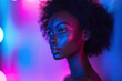 © sofiko14 - Portrait of woman illuminated by vibrant neon lighting effects