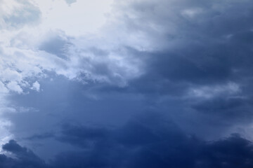 Wall Mural - background of dark clouds before thunder storm