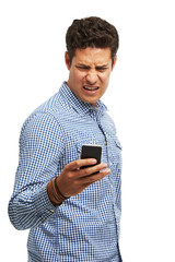 Angry, man and shocked with phone in studio for online bullying, argument and scam on social media. Person, stress and frustrated with tech for internet, gossip and fake news on white background