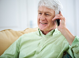 Canvas Print - Phone call, happy and senior man in home for communication, contact and conversation. Retirement, relax and elderly person on cellphone for talking, online chatting and speaking in living room