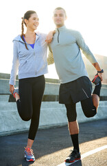 Wall Mural - Happy couple, stretching and road with fitness for workout preparation, exercise or training together in city. Man, woman and runners enjoying warm up or getting ready for running in an urban town