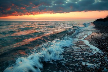 Poster - beach with waves crashing on the shore, peaceful coastline at sunset, with gentle waves lapping against the shore