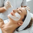 © Fotograf - Woman receives facial treatment at a beauty salon