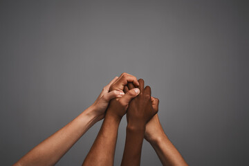 Poster - Teamwork, support and hands in studio for diversity, inclusion and acceptance against discrimination. People, society or community with trust for solidarity, awareness and mockup by gray background