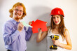 © Voyagerix - Couple doing house model renovation