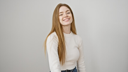 Poster - Smiling young caucasian woman with blonde hair, isolated on a white background, portraying natural beauty and happiness.