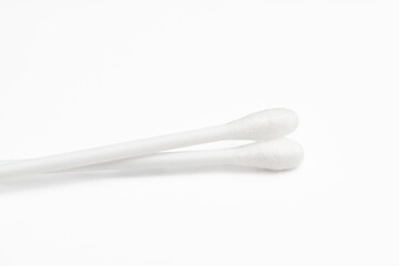 Plastic cotton swabs on white background