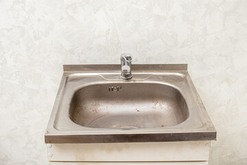 Dirty sink with rust. Kitchen sink overhead metal