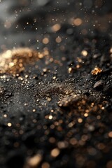 Poster - Golden particles twinkle on a dark surface, illuminated softly, creating a mesmerizing effect that draws attention to the fine details of the dust.