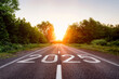 © Pawel - 2025 written on a highway asphalt road at the sunrise. 2025 new year concept. New year planning and motivation
