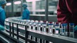 © Icon - scientist working in laboratory. Pharmaceutical scientist wearing sterile gloves inspects medical vials on a production line conveyor belt in a drug manufacturing facility.