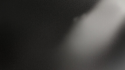 Fototapete - Black matte textured background with floating dust particles illuminated by soft light in the top right corner, creating a deep contrast between black and white. This abstract design emphasizes textur