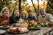 © Valentyna - A joyful multi-generational family enjoying an outdoor dinner with a table full of food, laughing and bonding in a natural setting during autumn