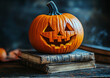© NE97 - A Halloween pumpkin stands on a stack of books, celebrating both the holiday and the back-to-school season at the same time.