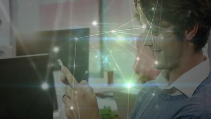 Poster - Using smartphone, man smiling with network connections animation in office background