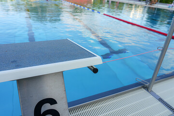 Poster - Starting blocks for diving into the pool.