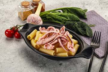 Wall Mural - Italian cuisine - pasta tortiglioni with squid