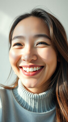 Wall Mural - Portrait of a smiling woman with long dark hair