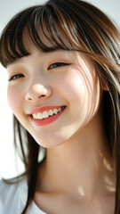 Poster - Close Up Portrait of a Young Woman with Beautiful Skin and a Bright Smile