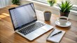 © Four888 - A sleek laptop on a clutter-free desk with a checked to-do list and a cup of coffee, symbolizing productivity and accomplishment in a modern workspace.