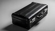 © Abdullah - A sleek black suitcase, top view, resting on a pristine white background. The perfect accessory for any business traveler.
