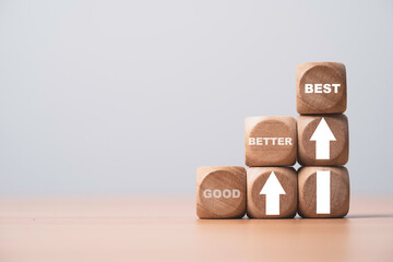 Poster - Good better and best on wooden block cube with up arrow for enhance and development product and service in the best condition concept.