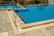 © Михаил Шорохов - staircase to the pool in summer in Cyprus in a residential complex