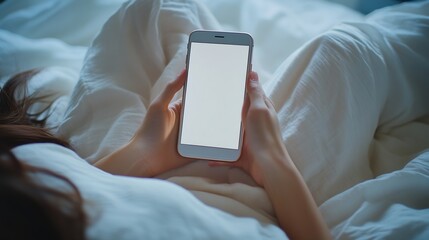 Aufkleber - Cropped view of female hands holding smart phone with blank screen for your text Woman reading messages on cell phone with home interior background while resting in bed Selective focus : Generative AI