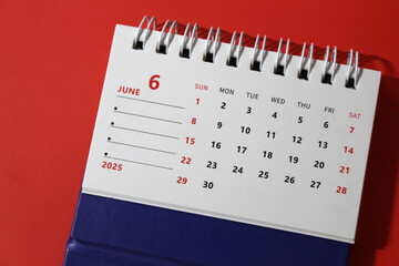 Monthly calendar template for the new year 2025 desk calendar,on red background.