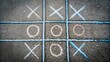 © Olga - Tic-Tac-Toe Game Drawn with Chalk on Pavement