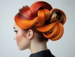 © Hanna - Elegant Updo with Vibrant Red and Orange Hair Highlights Showcasing Modern Hairstyling Techniques