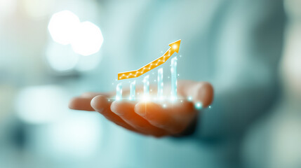 Poster - A hand gently cradles a luminous graph with an upward arrow, representing positive growth in business metrics, surrounded by a blurred background