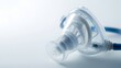 © Heng Heng - AI Stock - Closeup of a nebulizer mask an essential medical equipment used for respiratory therapy and treatment of various lung conditions such as asthma COPD and pneumonia